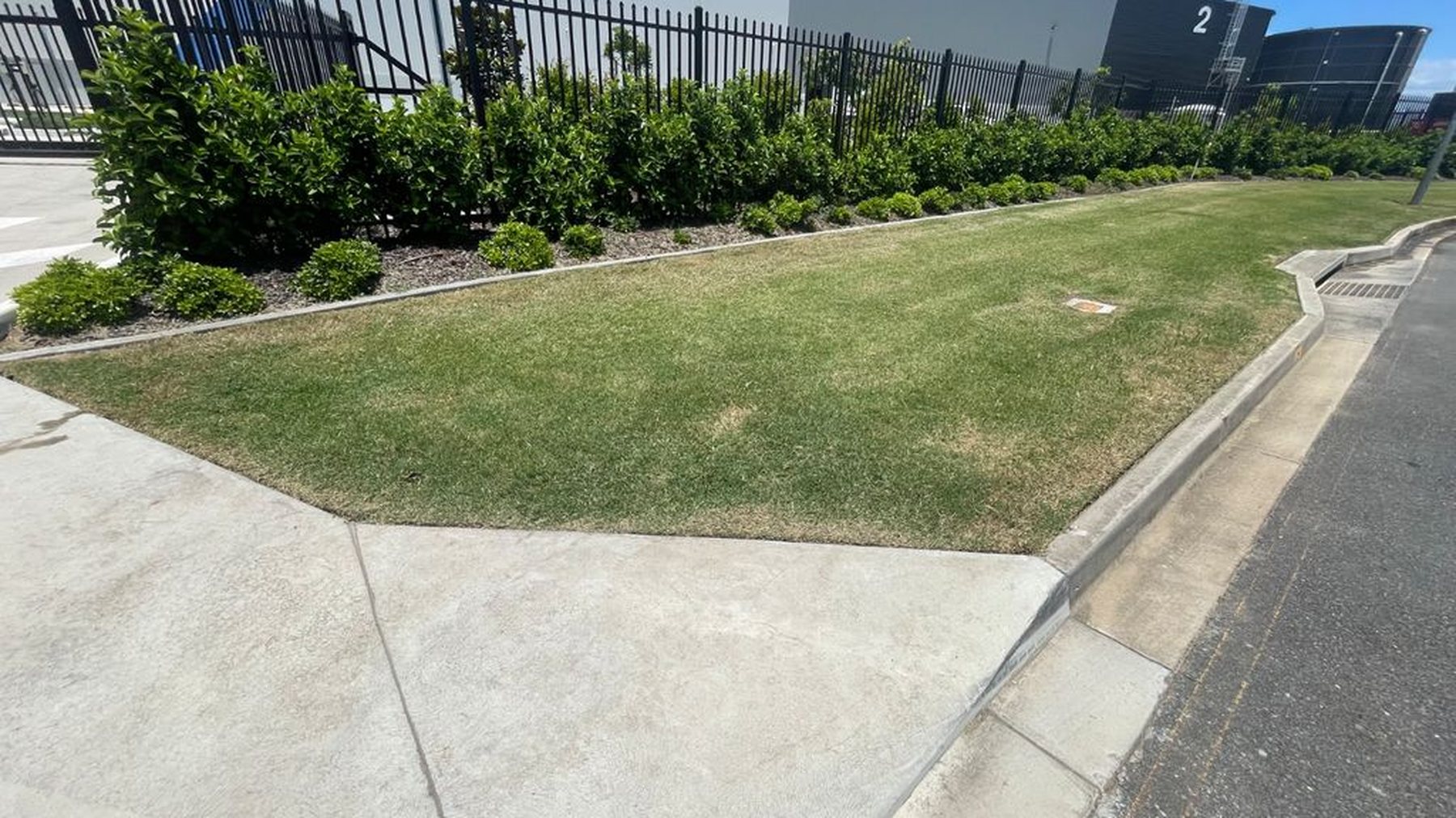 Charter Hall Industrial — large industrial estate building with established hedging and maintained lawn